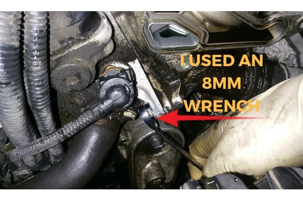 BMW-f25-oil-filter-housing-gasket-removal-using-8mm-wrench